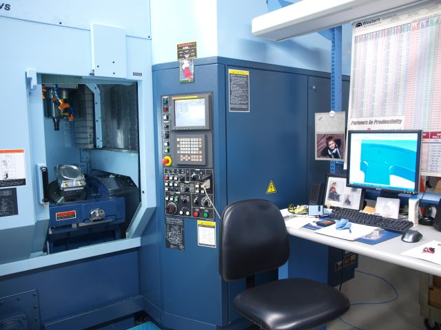 Precision Five Axis Mill With 40 Position Stocker